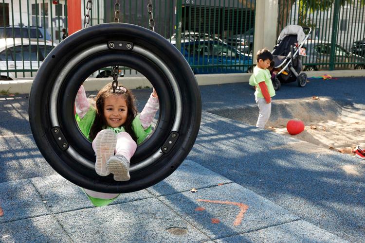 Children from Mission Kids Preschool playing at Parque Niños Unidos playground on Monday, Nov. 28, 2022.