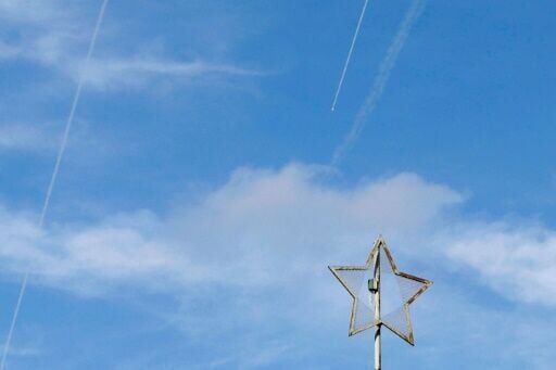 Rockets fired from southern Lebanon are intercepted by Israeli air defences over the western Galilee region in northern Israel