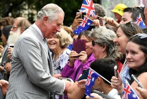 Then Prince Charles is greeted by members of the public during a visit to Brisbane, Australia in 2018