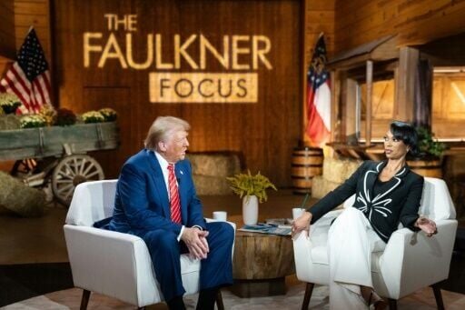 Donald Trump with Fox News broadcaster Harris Faulkner for a townhall event in Cumming, Georgia