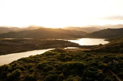 Aerial view of the city destroyed by floods following the collapse of the Fundão dam in Bento Rodrigues village, Minas Gerais state, Brazil, on October 14, 2024.  Emanuele Vitoria was at home with her father and brother when a river of mud bore down on ...